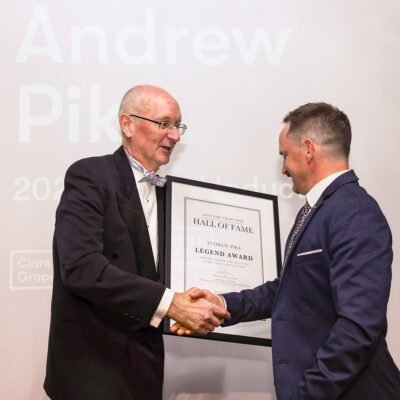 Jamie Pike accepting Andrew Pikes award